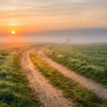 Winding path through green fields at sunrise, symbolising guidance, direction, and trusting God’s leading